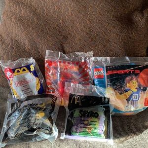Various McDonalds Happy Meal Toys and one Superman from Burger King.